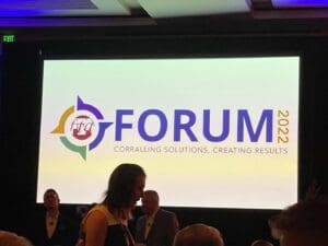 a screen displaying Forum 2022